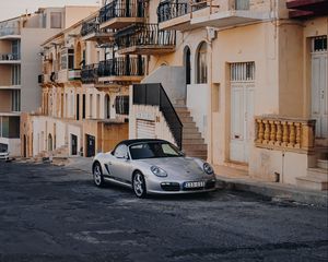 Preview wallpaper porsche, sports car, building, facade, street, marsalforn, malta