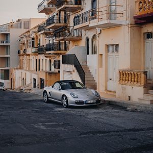 Preview wallpaper porsche, sports car, building, facade, street, marsalforn, malta