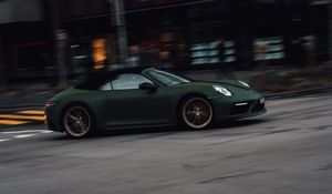 Preview wallpaper porsche, sports car, car, green, street, speed