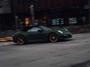 Preview wallpaper porsche, sports car, car, green, street, speed