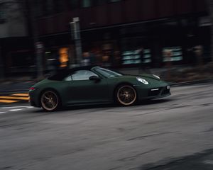 Preview wallpaper porsche, sports car, car, green, street, speed