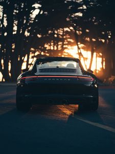 Preview wallpaper porsche, sports car, rear view, black, sunlight