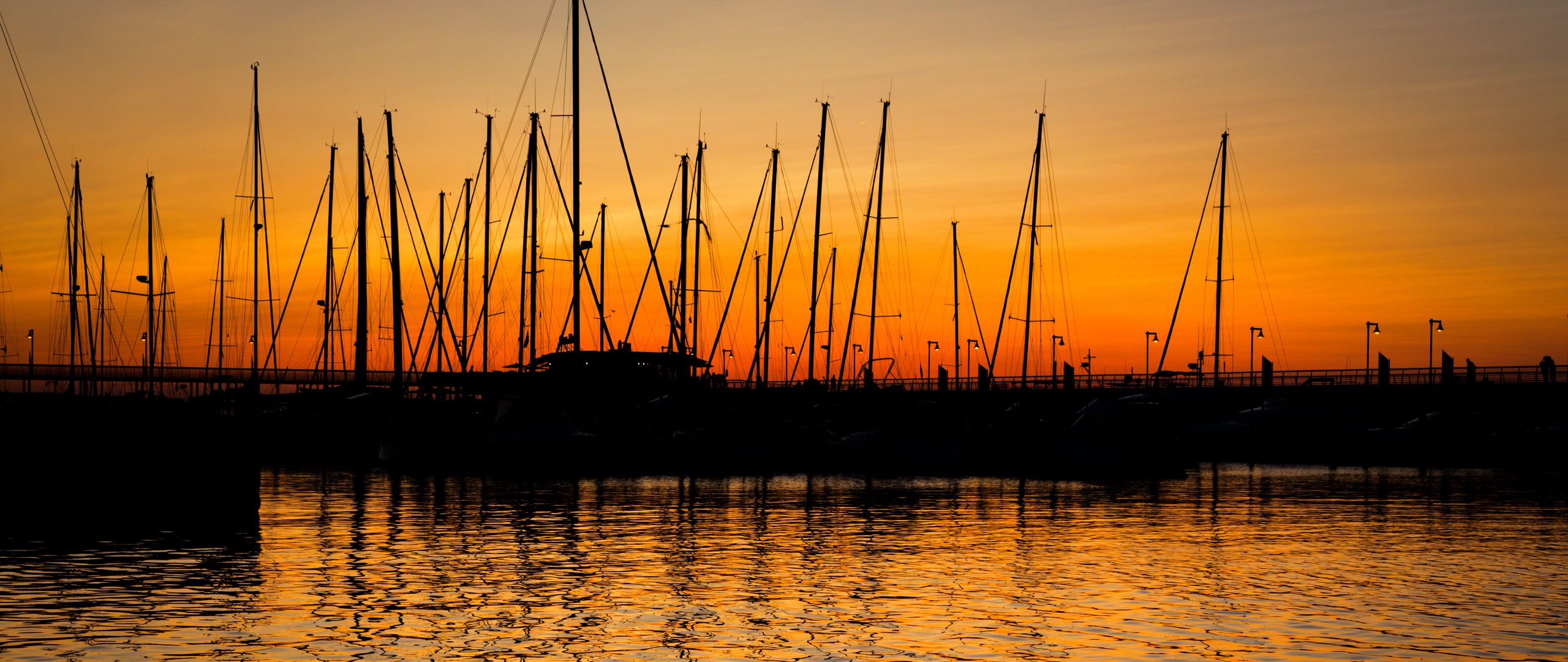 download-wallpaper-2560x1080-port-sunset-dusk-boats-dual-wide-1080p