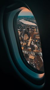 Preview wallpaper porthole, airplane, city, window