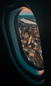 Preview wallpaper porthole, airplane, city, window