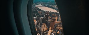 Preview wallpaper porthole, airplane, city, window