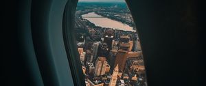 Preview wallpaper porthole, airplane, city, window