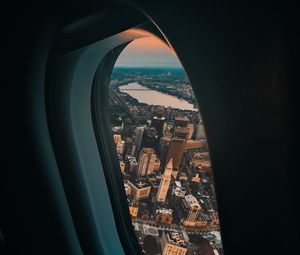 Preview wallpaper porthole, airplane, city, window