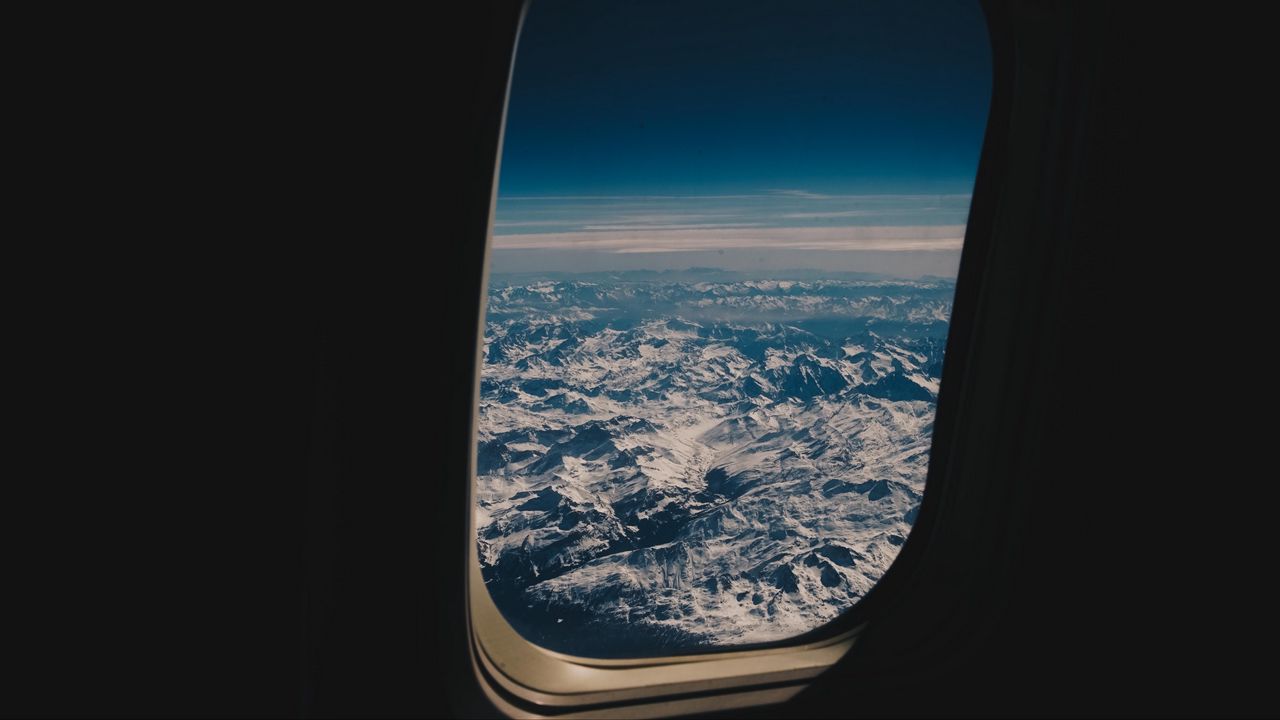 Wallpaper porthole, airplane, mountains