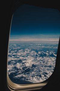 Preview wallpaper porthole, airplane, mountains