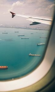 Preview wallpaper porthole, airplane, top view