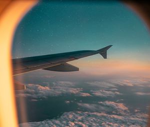 Preview wallpaper porthole, airplane window, airplane wing, airplane, flight, sky
