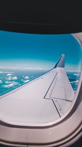Preview wallpaper porthole, airplane, wing, sky