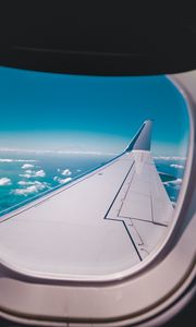 Preview wallpaper porthole, airplane, wing, sky