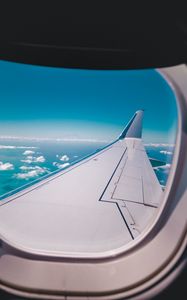 Preview wallpaper porthole, airplane, wing, sky