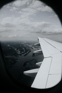 Preview wallpaper porthole, airplane, wing, view, overview