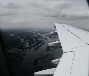 Preview wallpaper porthole, airplane, wing, view, overview