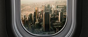 Preview wallpaper porthole, city, skyscrapers, aerial view, window