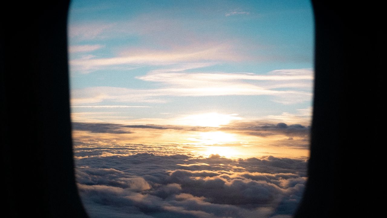 Wallpaper porthole, clouds, sunset, black