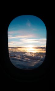 Preview wallpaper porthole, clouds, sunset, black