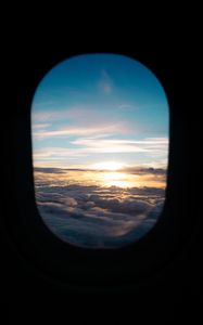 Preview wallpaper porthole, clouds, sunset, black