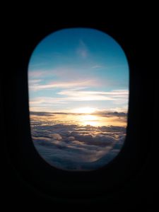 Preview wallpaper porthole, clouds, sunset, black