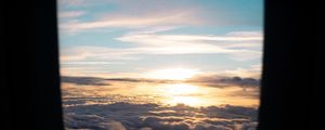 Preview wallpaper porthole, clouds, sunset, black
