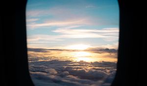 Preview wallpaper porthole, clouds, sunset, black