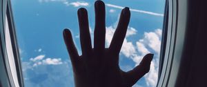 Preview wallpaper porthole, hand, airplane, window, clouds