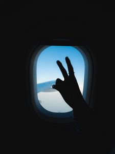 Preview wallpaper porthole, hand, gesture, sky