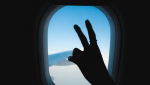 Preview wallpaper porthole, hand, gesture, sky