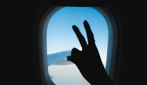 Preview wallpaper porthole, hand, gesture, sky