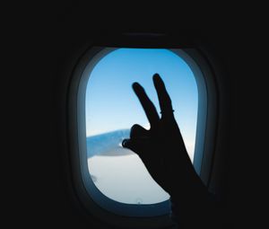 Preview wallpaper porthole, hand, gesture, sky