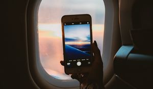 Preview wallpaper porthole, hand, phone, view, dark