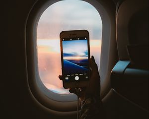 Preview wallpaper porthole, hand, phone, view, dark