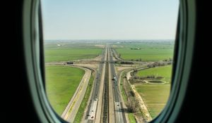 Preview wallpaper porthole, road, window