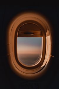 Preview wallpaper porthole, window, airplane, dark, view