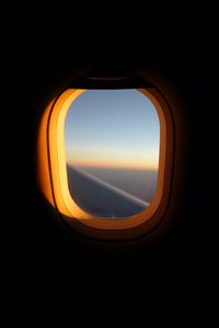 Preview wallpaper porthole, window, airplane, dark