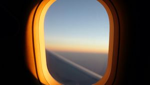 Preview wallpaper porthole, window, airplane, dark