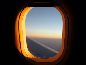 Preview wallpaper porthole, window, airplane, dark