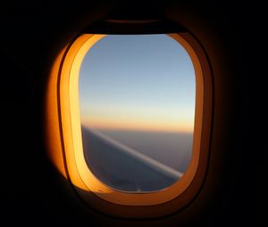 Preview wallpaper porthole, window, airplane, dark