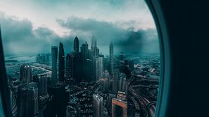 Preview wallpaper porthole, window, city, aerial view