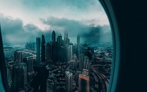 Preview wallpaper porthole, window, city, aerial view