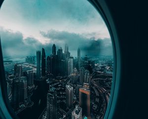 Preview wallpaper porthole, window, city, aerial view