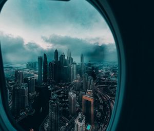 Preview wallpaper porthole, window, city, aerial view