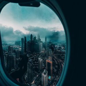 Preview wallpaper porthole, window, city, aerial view