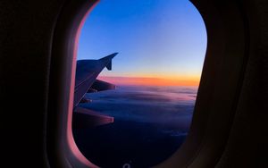 Preview wallpaper porthole, window, plane, flight, airplane wing, sky