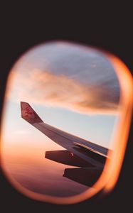 Preview wallpaper porthole, window, plane, wing, view, flight