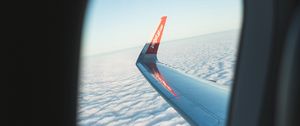 Preview wallpaper porthole, window, plane, wing, clouds, view