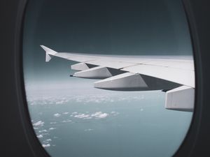 Preview wallpaper porthole, window, wing, plane, view